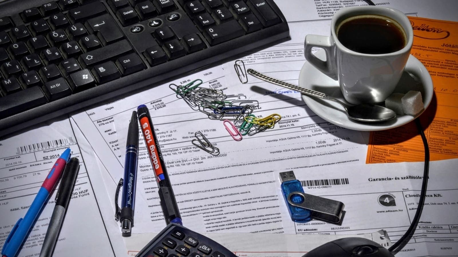 Paperwork and figures of the kind behind a drug price